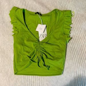 Green ruffle crop top